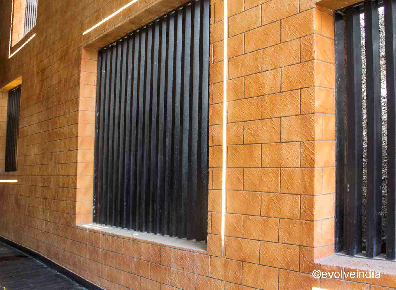 Seamless wall designed using corten steel finish by Evolve India