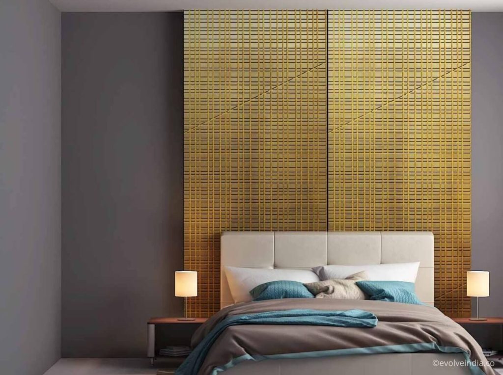 Bed back wall designed using textured liquid metal panels by Evolve India