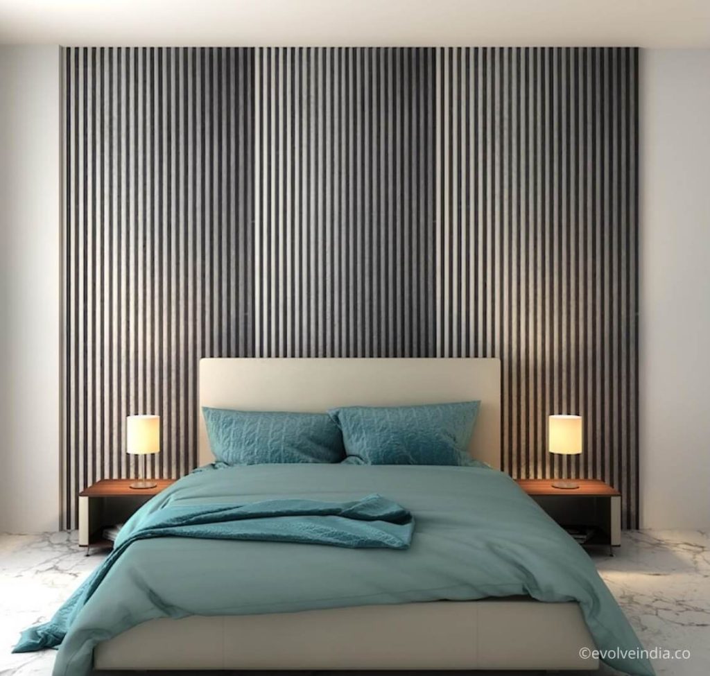 Bed back wall designed using textured liquid metal panels by Evolve India