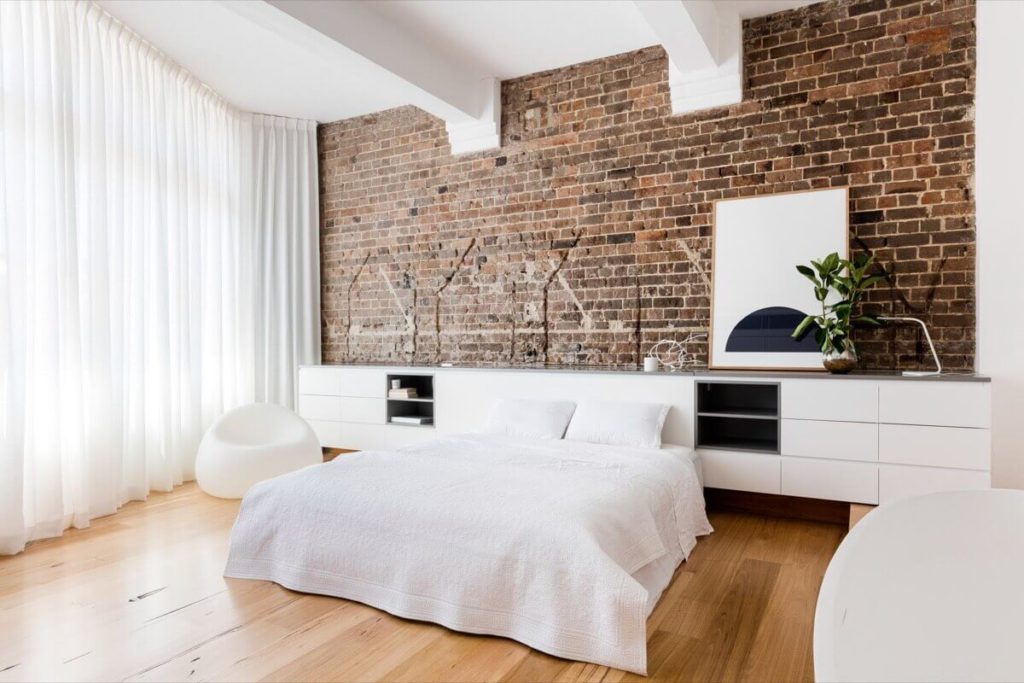 Exposed brick wall design for bedroom wall decor