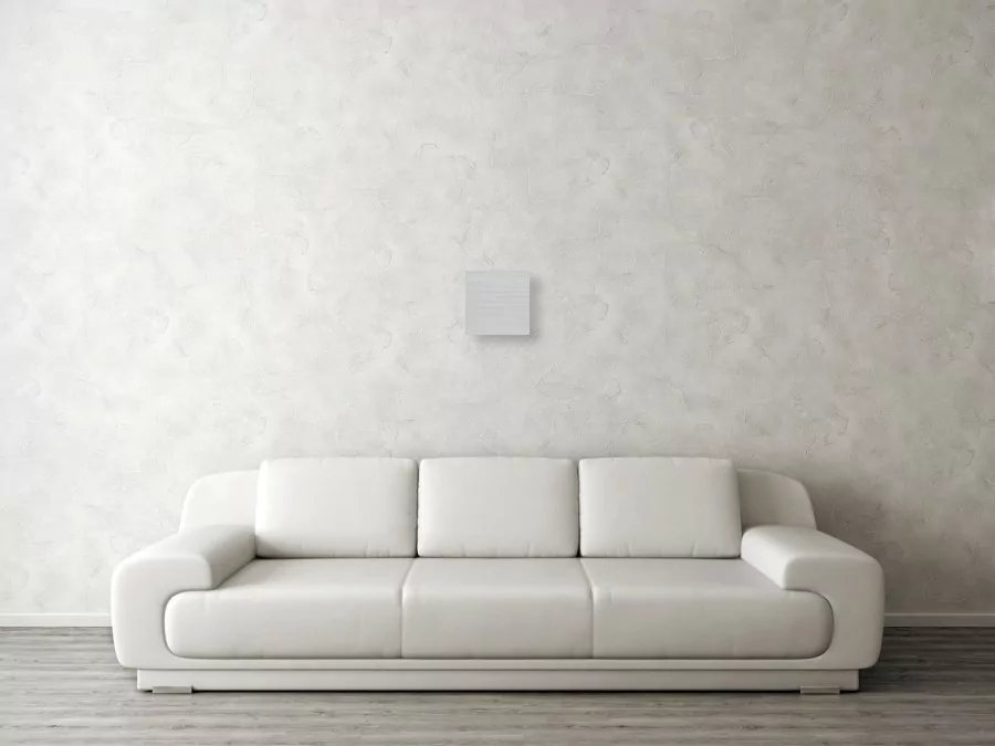 Image of a living room wall designed using textured concrete finish