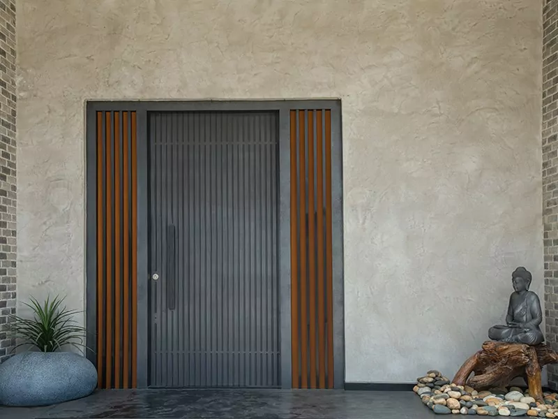 Modern door design by Evolve India, finished using gun metal liquid metal coating