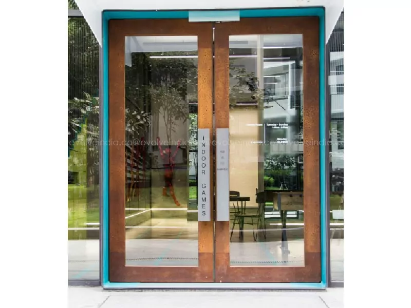 An image depicting a building entrance door finished using liquid metal