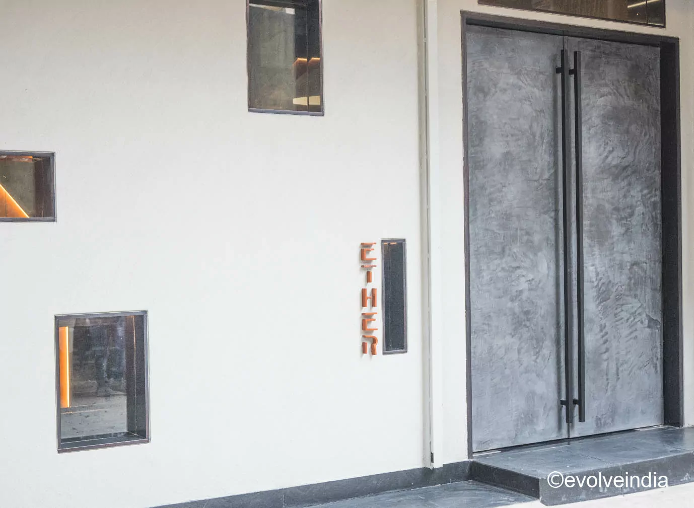 Door designed with Evolve India’s decorative concrete finish