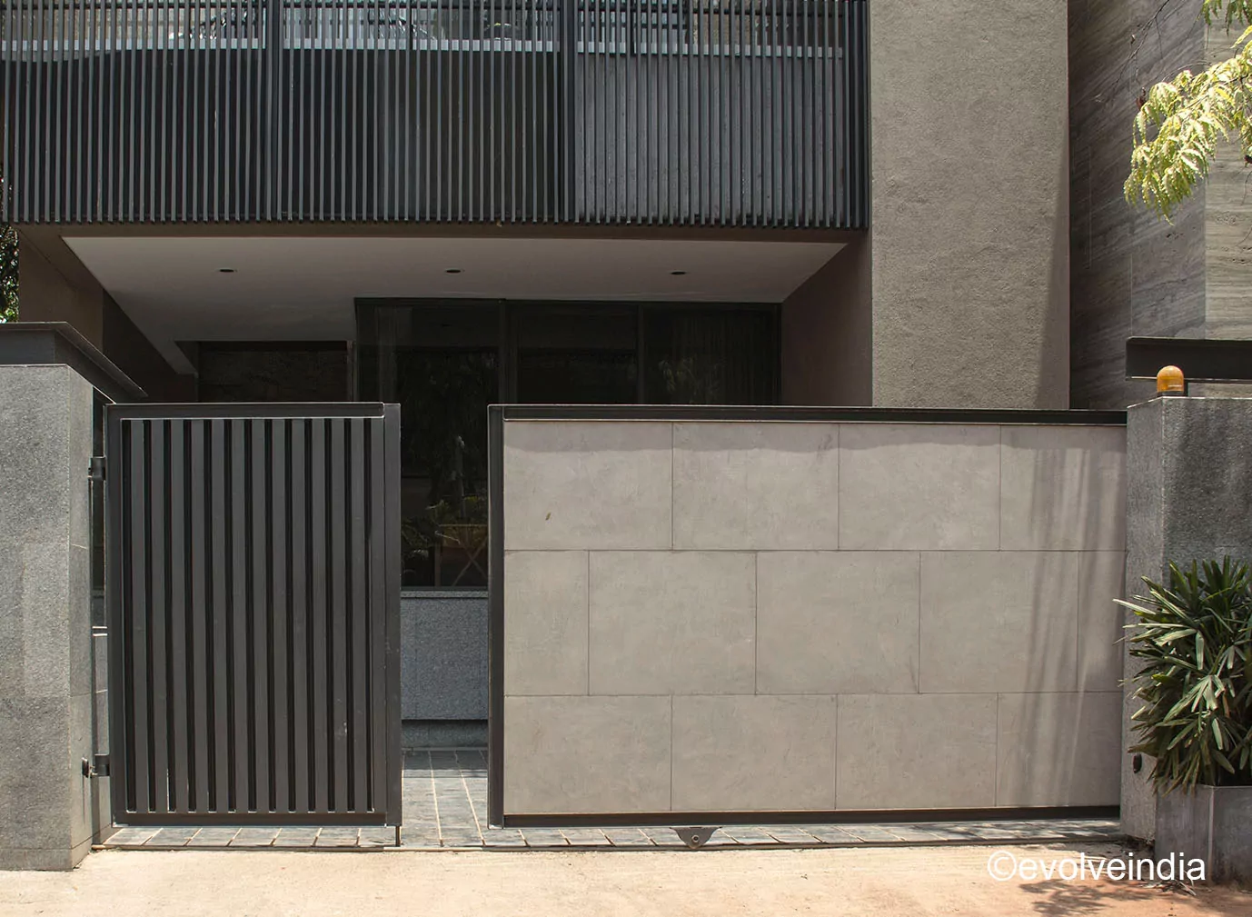 Exterior Wall Texture Design of A Residential Space done by Evolve India using decorative concrete finishes