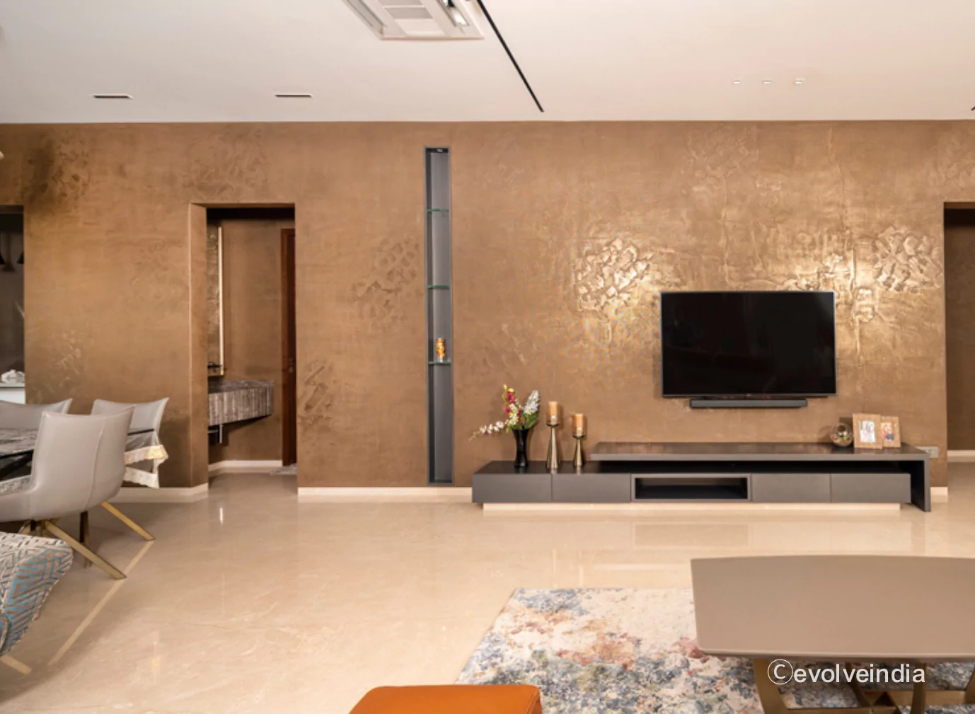 Accent wall designed using liquid metal bronze finish by Evolve India