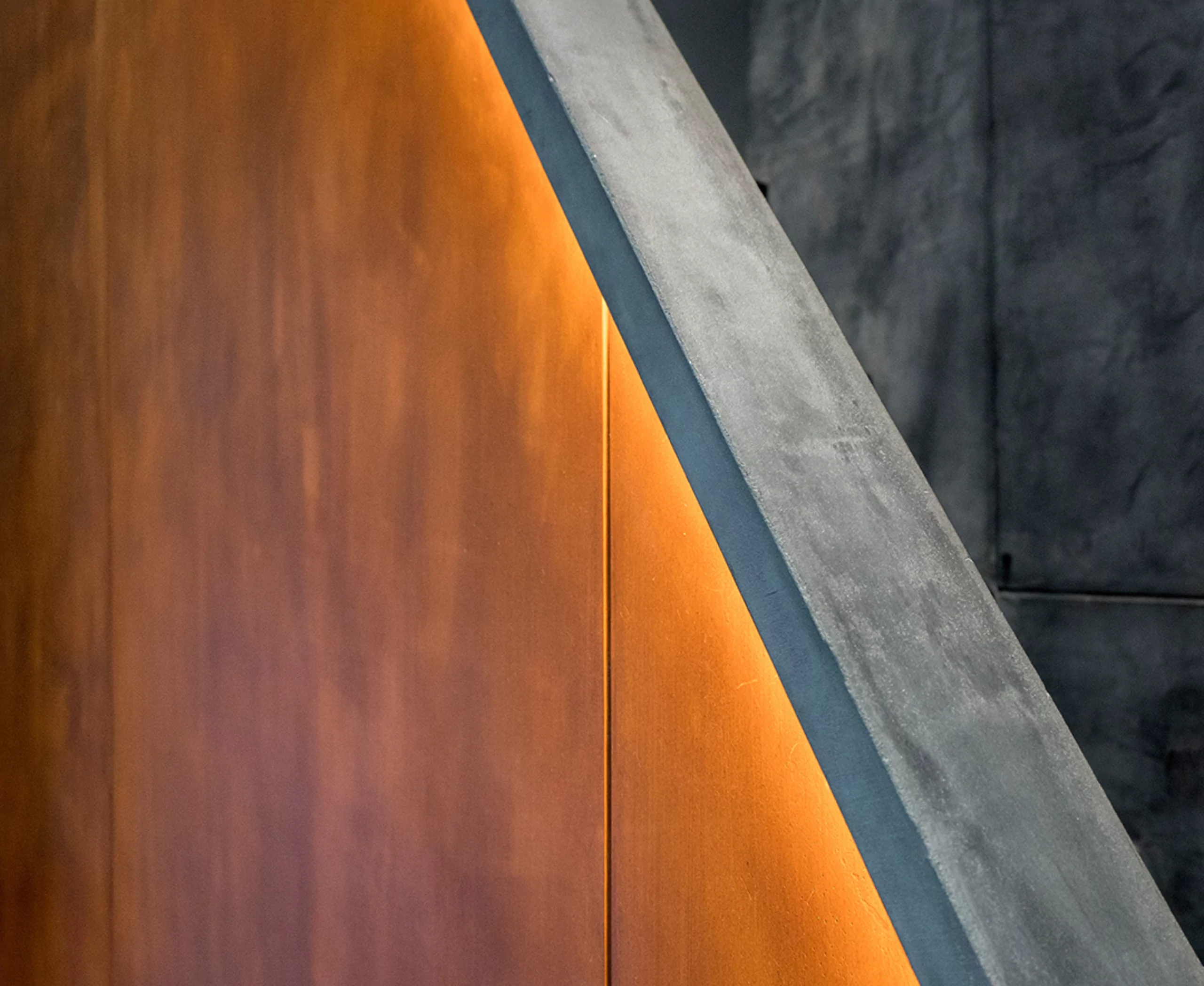 Staircase wall designed using corten steel finish and decorative concrete finish